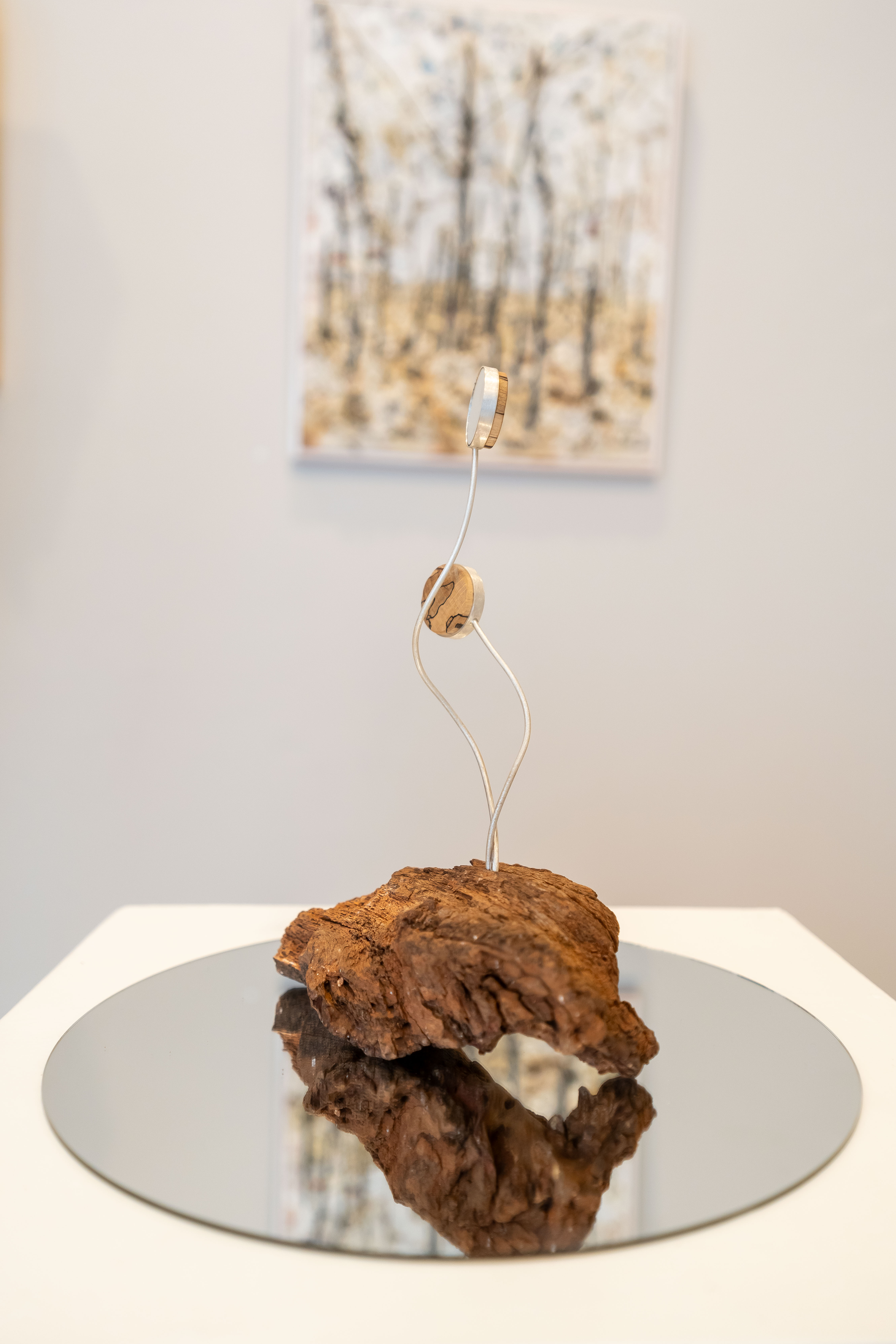 NATURA MORTA I jewelry object with wood, silver and reflective surface